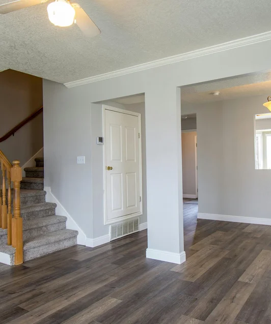 Interior renovation — luxury hardwood flooring, open plan living and staircase